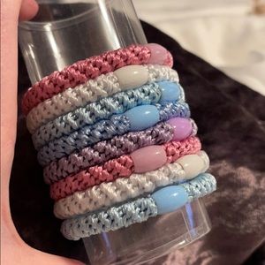 Eight brand new L Erickson hair elastics